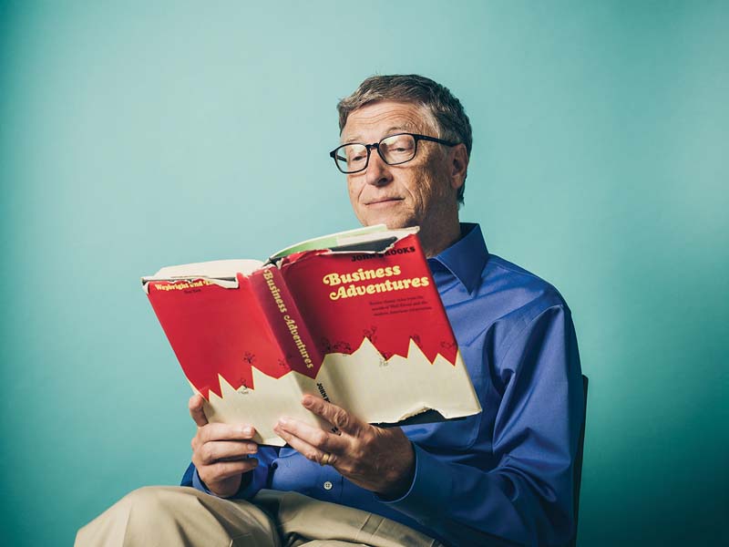 Bill Gates reading his favorite business book, Business Adventures by John Brooks.  Shot for The Wall Street Journal.  The book in this picture was lent to Bill by Warren Buffett 20 years ago, and Bill still has it.  Just borrowing it of course.  This WSJ article took Business Adventures from being relatively unknown for 45 years to a best seller practically overnight.